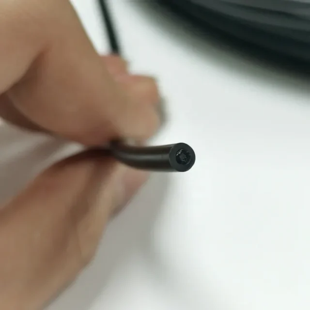 Black PE simplex POF cable close up of jacket