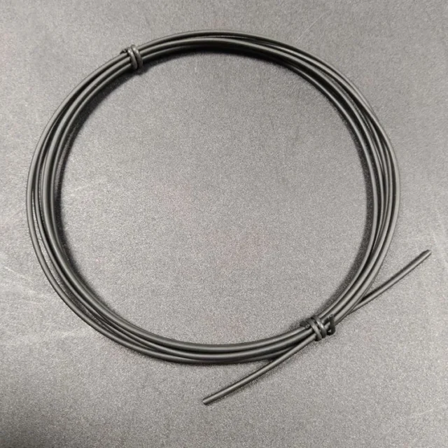 Cut end of black PE POF exposing clear 1.5mm core
