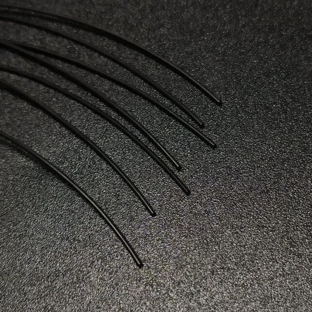 Reel of black tight-buffer POF