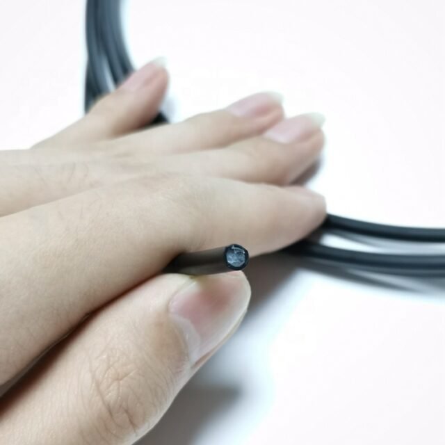 End view showing one fiber under the black jacket