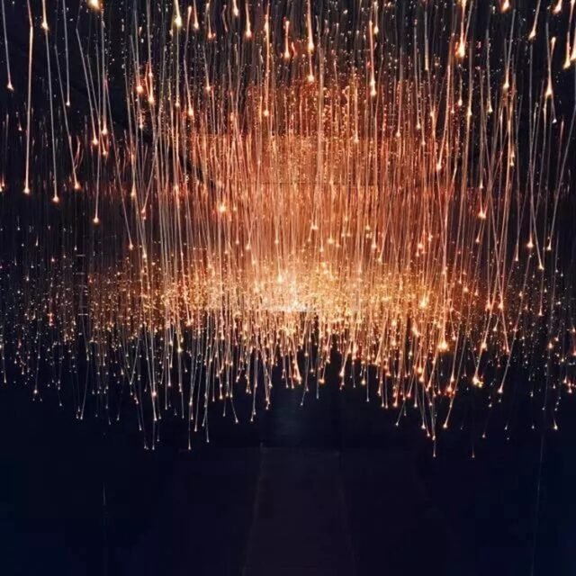Warm-white end-glow fiber curtain hanging installation