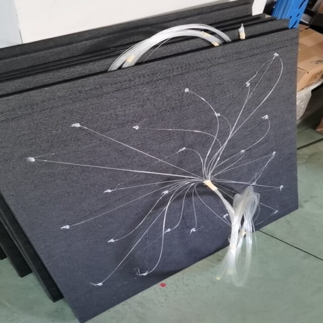 Black star ceiling panel with bundled PMMA fiber tails