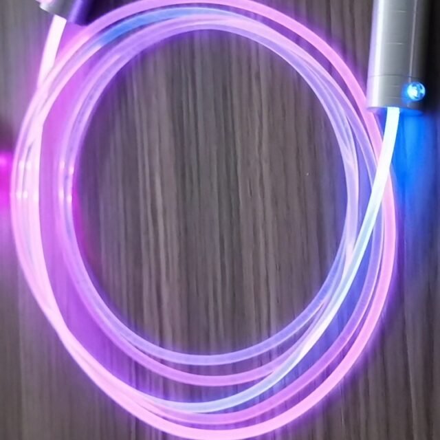 Side glow fiber optic cable in bright color light