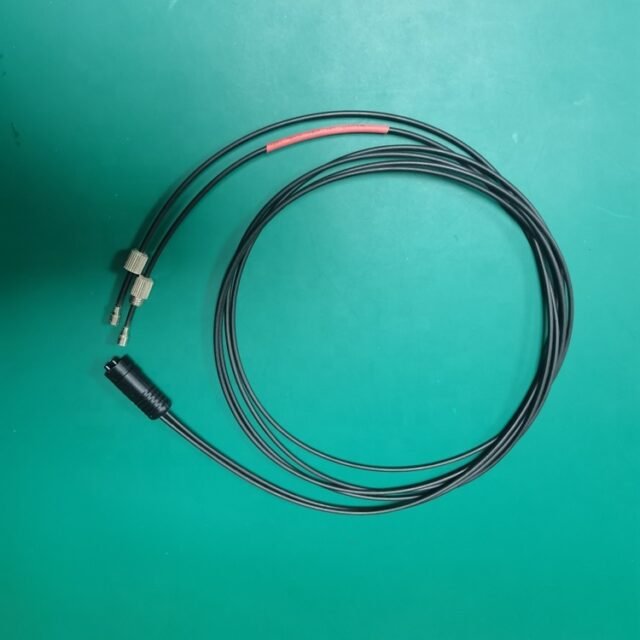 Black loop optical path POF jumper with SC connector and dual SMI metal connectors on green background