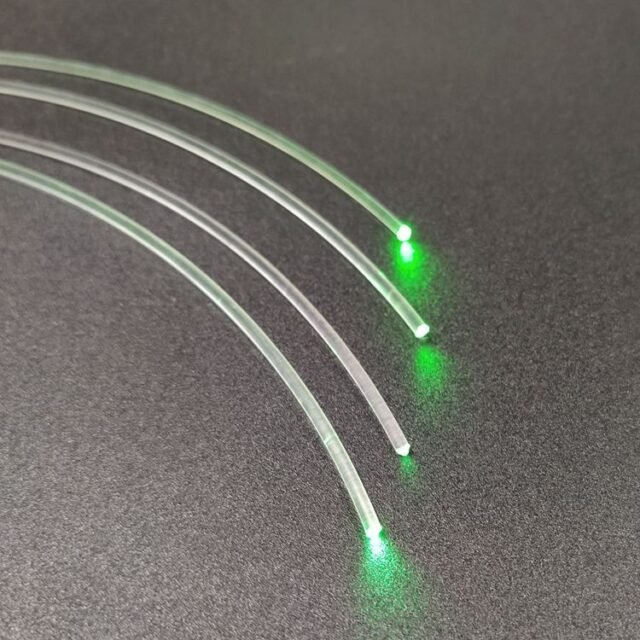 Mitsubishi Eska SK-60 clear PMMA end-glow fibers with green light at the ends