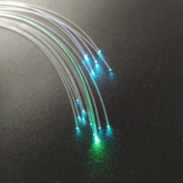 Green and blue end-glow points on clear PMMA fibre