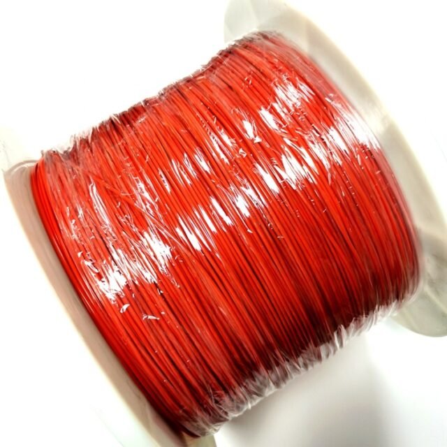 Orange automotive MOST POF cable wound on a plastic spool, wrapped in clear film