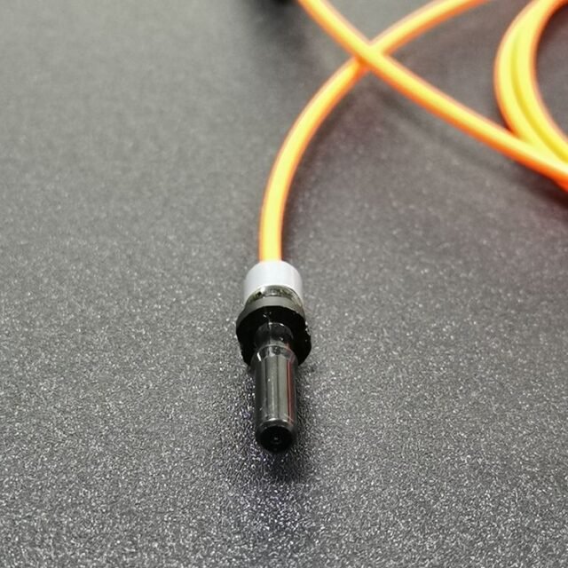 Single Avago V-Pin connector body on orange HPCS fiber