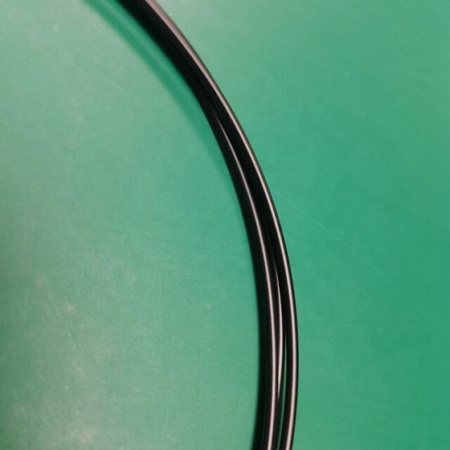 Detail of black PMMA sensor fiber optic jumper