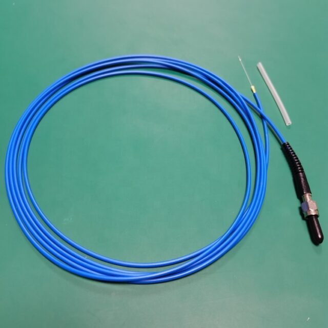 Detail of blue SMA905 POF pigtail on green work mat