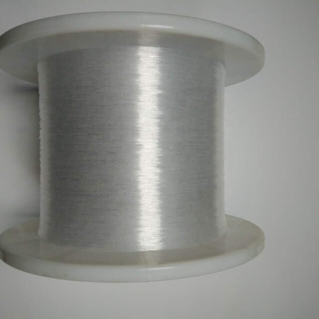 Spool of clear 0.75mm PMMA fiber used for multi-string bundles