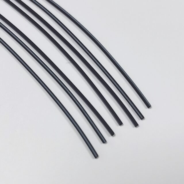 Black PE Toray large-core POF cables stripped to clear fibres