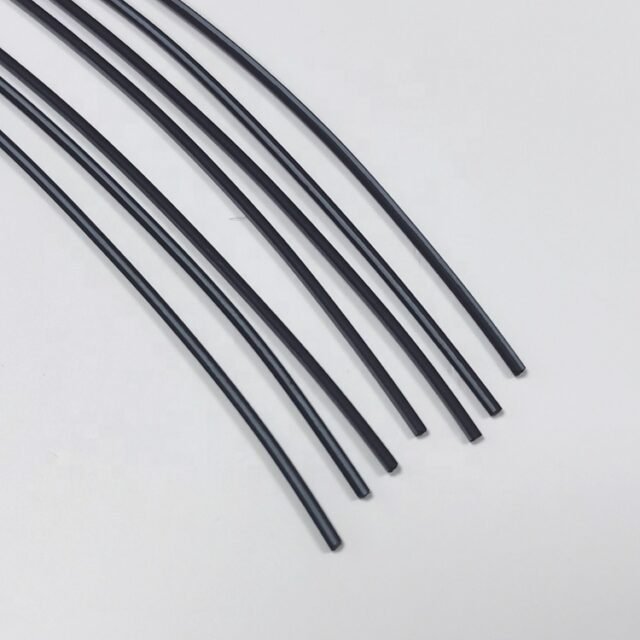 Black PE Toray POF cables stripped to clear fibres glowing